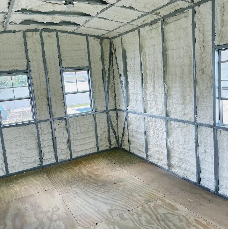 Closed-cell spray foam insulation applied to wall cavities in a residential project in Markham